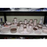 Poole Pottery table service and table lamp, approximately 70 pieces.