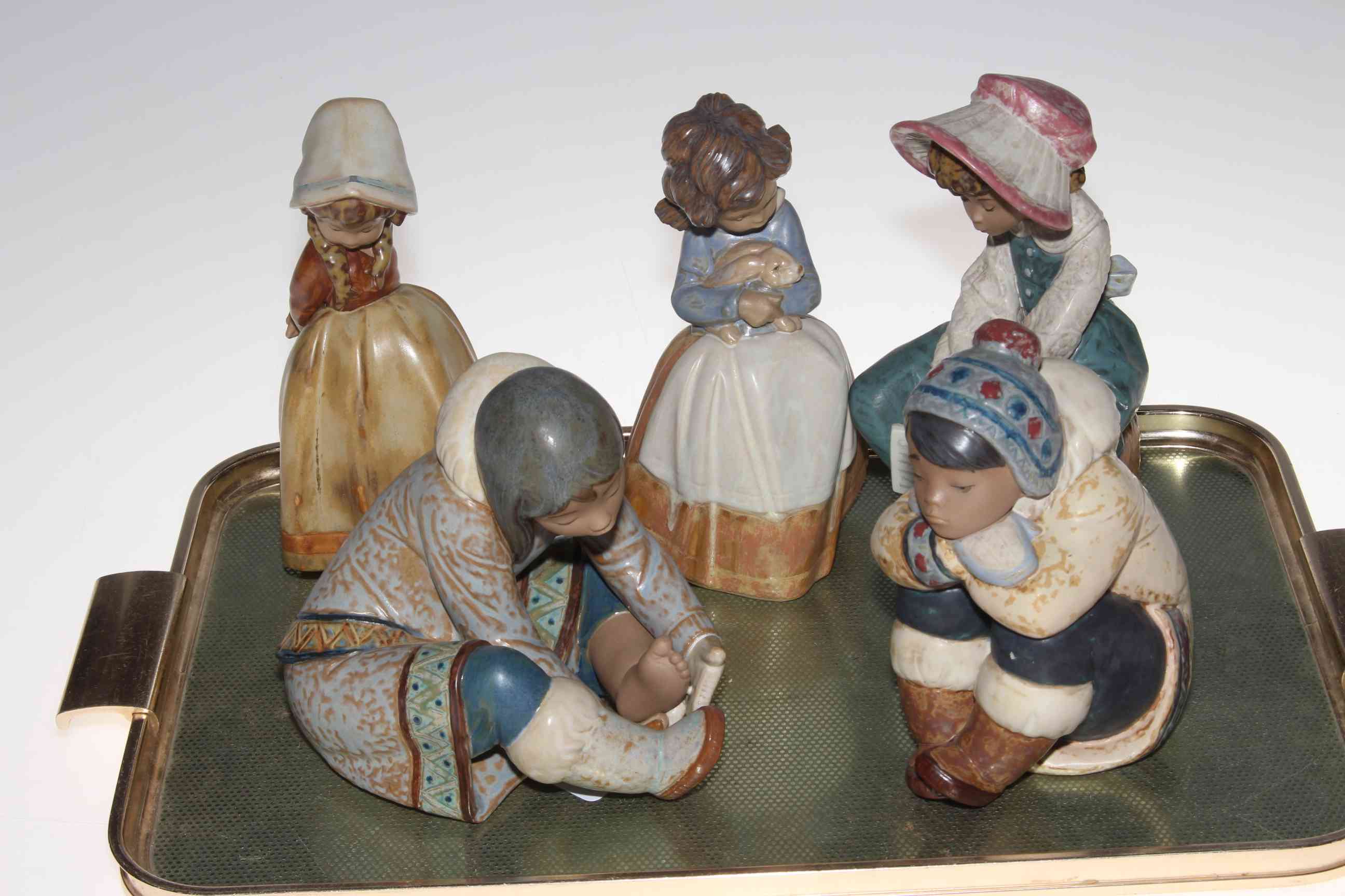 Two Lladro Eskimo figures and three Lladro girl figures (5).