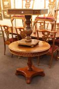 Walnut four drawer pedestal games table and circular pedestal breakfast table (2).