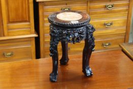 Oriental hardwood and marble inset jardiniere stand, 31cm by 20cm diameter.