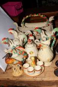 Collection of Clarice Cliff (and copies?), twelve pieces including hen teapots, weave teapot,