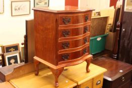 Small yew four drawer serpentine front chest, 58.5cm by 42cm by 35cm.