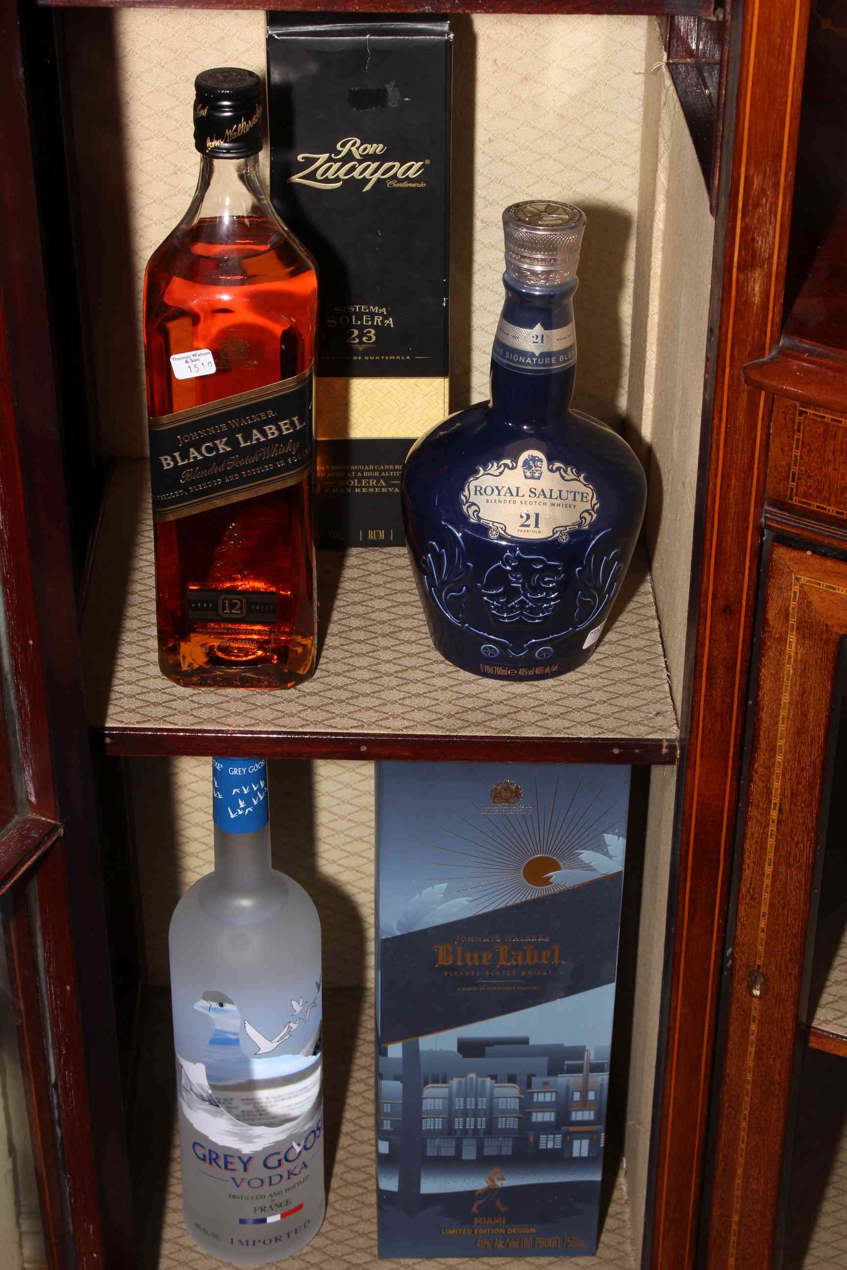Five bottles of spirits including limited edition Miami Blue Label Johnnie Walker 750ml,