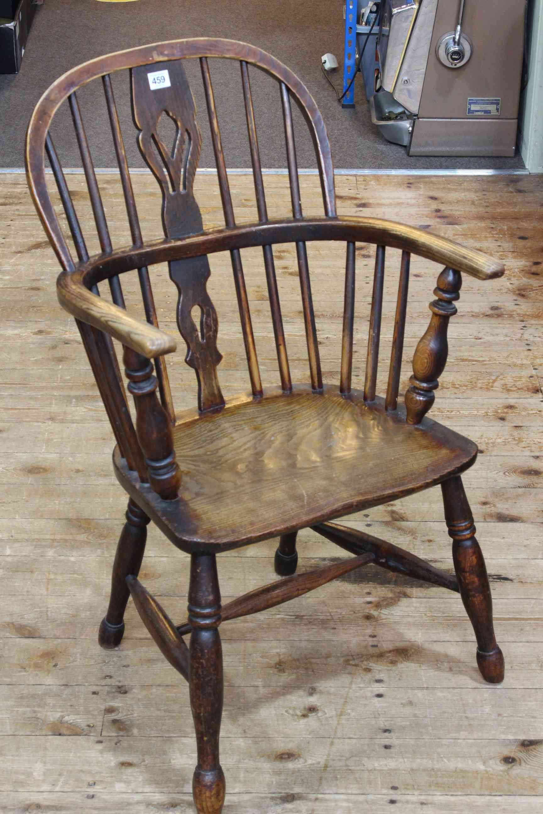 Antique Windsor pierced splat back elbow chair.