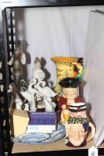 Three Lladro and two Nao figurines, Burleigh ware decorative jug,