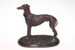 Bronze greyhound with neckerchief, 26cm high.
