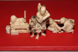 Three small Japanese ivory okimonos including signed two figure group, 7.5cm across.