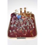 Tray lot with collection of crystal miniatures, brass ornaments and paperweights.