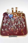 Tray lot with collection of crystal miniatures, brass ornaments and paperweights.