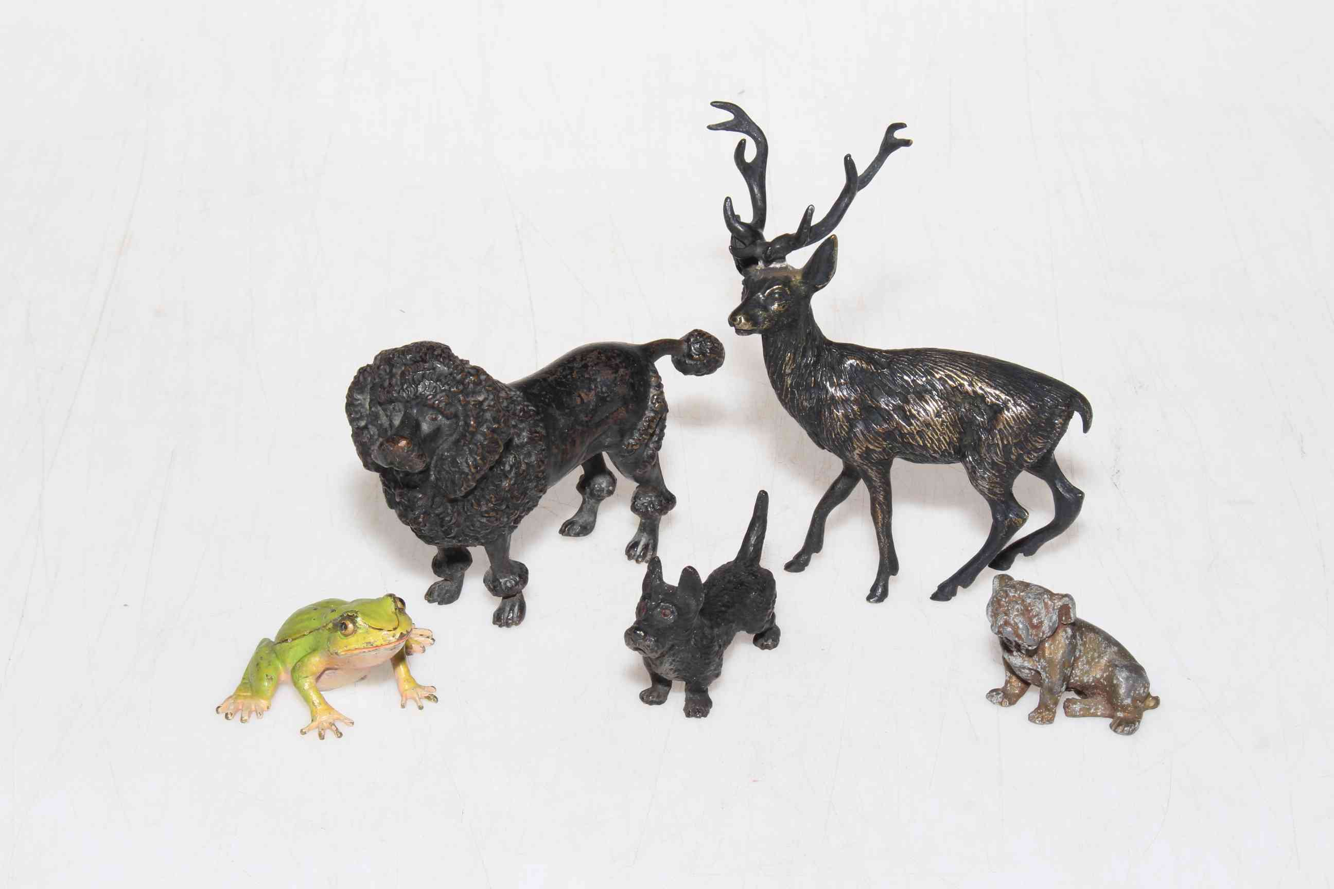 Collection of five small bronze/metal animal figures comprising stag, poodle, terrier,