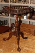 Circular mahogany galleried topped occasional table on pedestal tripod base, 64cm by 47cm diameter.