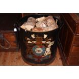 Large Armorial painted two handled log bin and logs, 59cm by 56.5cm diameter.