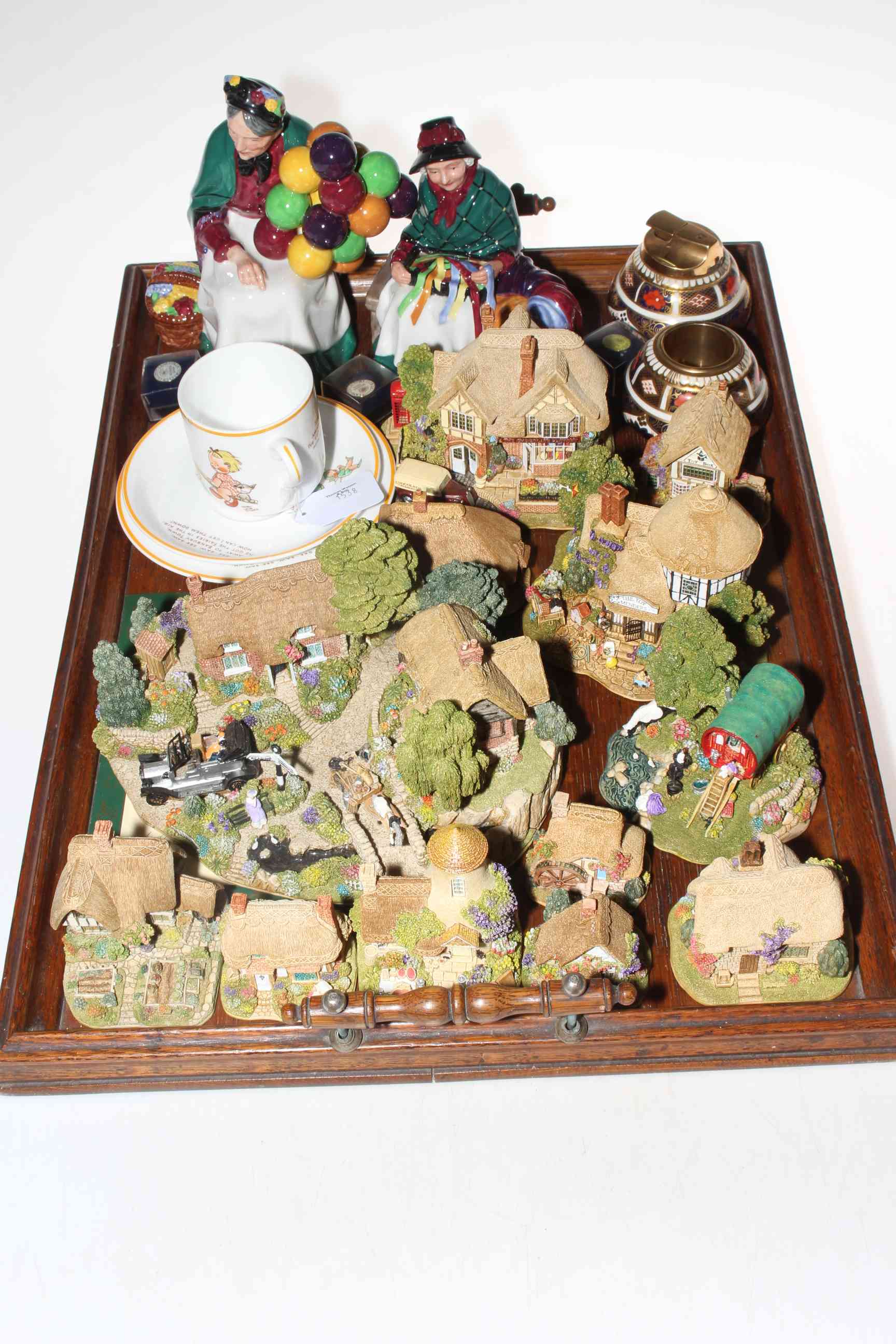 Collection of twelve Lilliput Lane models including Rags to Riches, two Royal Doulton figures,