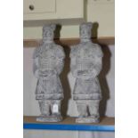 Two composite warrior sculptures, 58cm high.