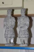 Two composite warrior sculptures, 58cm high.