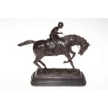 Bronze jockey on marble base, 35cm high.