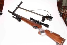 Falcon .22 air rifle with air pump, fitted with sight and bipod.