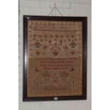 19th Century alphabet and text sampler by Mary Bainbridge in oak frame, 87cm by 67cm overall.