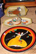 Clarice Cliff, two crocus plates, pomander and two Wedgwood 'Age of Jazz' plaques.