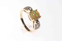 Opal and white Sapphire ring set in 9 carat yellow gold, size N½, with certificate.