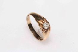 Gents single stone diamond ring set in 9 carat yellow gold, size T.