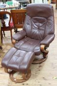 Himolla brown leather reclining chair and footstool.