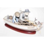 Lladro 'Fishing with Gramps' group on wood base 5215, 38cm length.