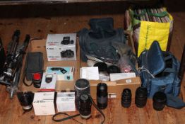 Canon cameras, various lenses, tripods and accessories, LP records, etc.