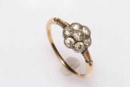 18 carat yellow gold seven stone petal design diamond ring, size S½.