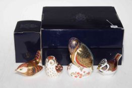 Four Royal Crown Derby paperweights including Wren, Owlet, Crested Tit and Kingfisher.