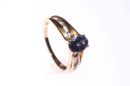 9 carat gold one carat Tanzanite and Diamond ring, size P½.