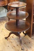 Georgian mahogany graduated three tier circular dumb waiter on tripod base, 101cm.