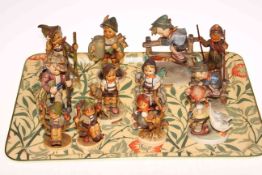 Collection of twelve Hummel figures including Skier, Apple Tree Boy & Girl,