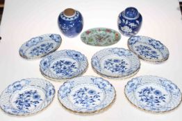 Eight Meissen blue and white cabinet plates and four oval dishes each with pierced borders,