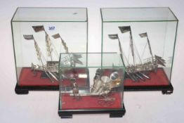 Two Chinese silver junks and Chinese Merchant with rickshaw, all cased (3).