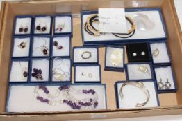 Collection of Amethyst and Mother of Pearl jewellery.