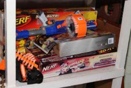 Collection of Nerf toys.