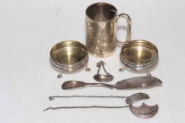 Engraved silver tankard, pair of silver salts, silver butter knife and three decanter labels.