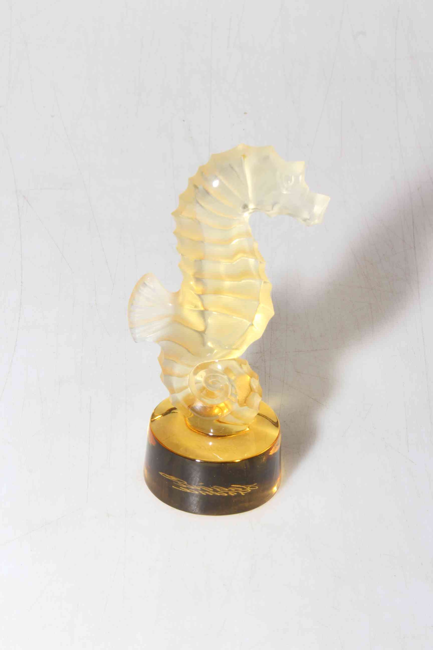 Lalique amber glass sea horse paperweight, boxed.