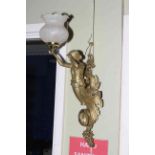 Pair of gilt metal ornate lady wall lights with frosted glass shades, approximately 58cm.