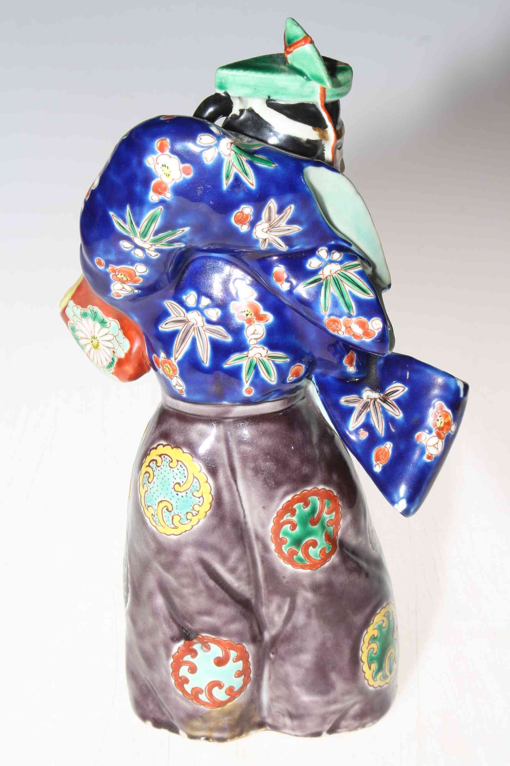 Japanese polychrome porcelain figure. - Image 2 of 3