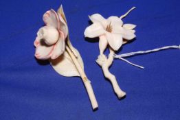 Two carved Japanese ivory flower.