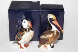 Two Royal Crown Derby paperweights, Puffin and Brown Pelican, with boxes.