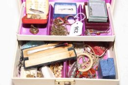 Jewellery box containing collection of costume jewellery.