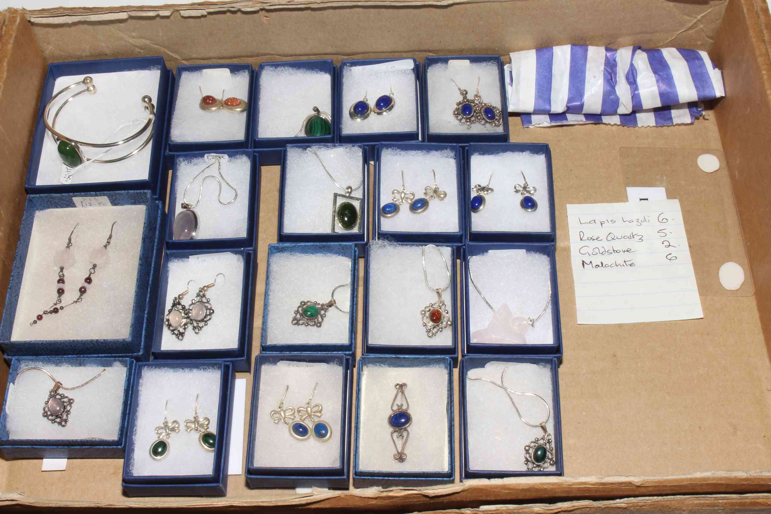 Collection of Lapis Lazuli, Malachite, Goldstone and Rose Quartz jewellery.