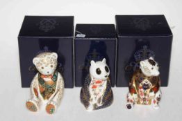 Three Royal Crown Derby paperweights including Panda, Imari Honey Bear and The Regal Goldie Bear,