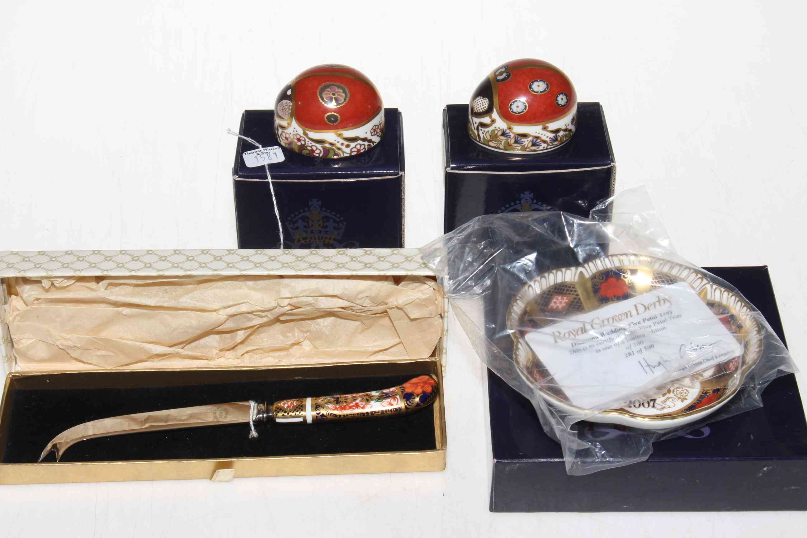 Two Ladybird Royal Crown Derby paperweights, Diamond Wedding five petal tray and a knife (4).
