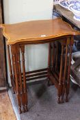 Nest of three Edwardian mahogany and satinwood inlaid tables of serpentine form (largest 71cm by