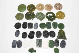 Collection of Chinese jade and other roundels.