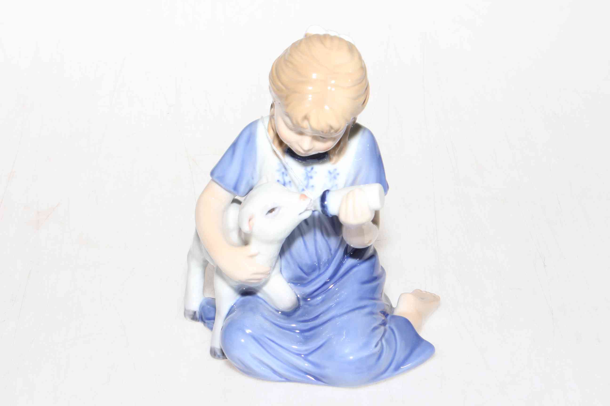 Royal Copenhagen figure, Girl Bottle Feeding Lamb, boxed.